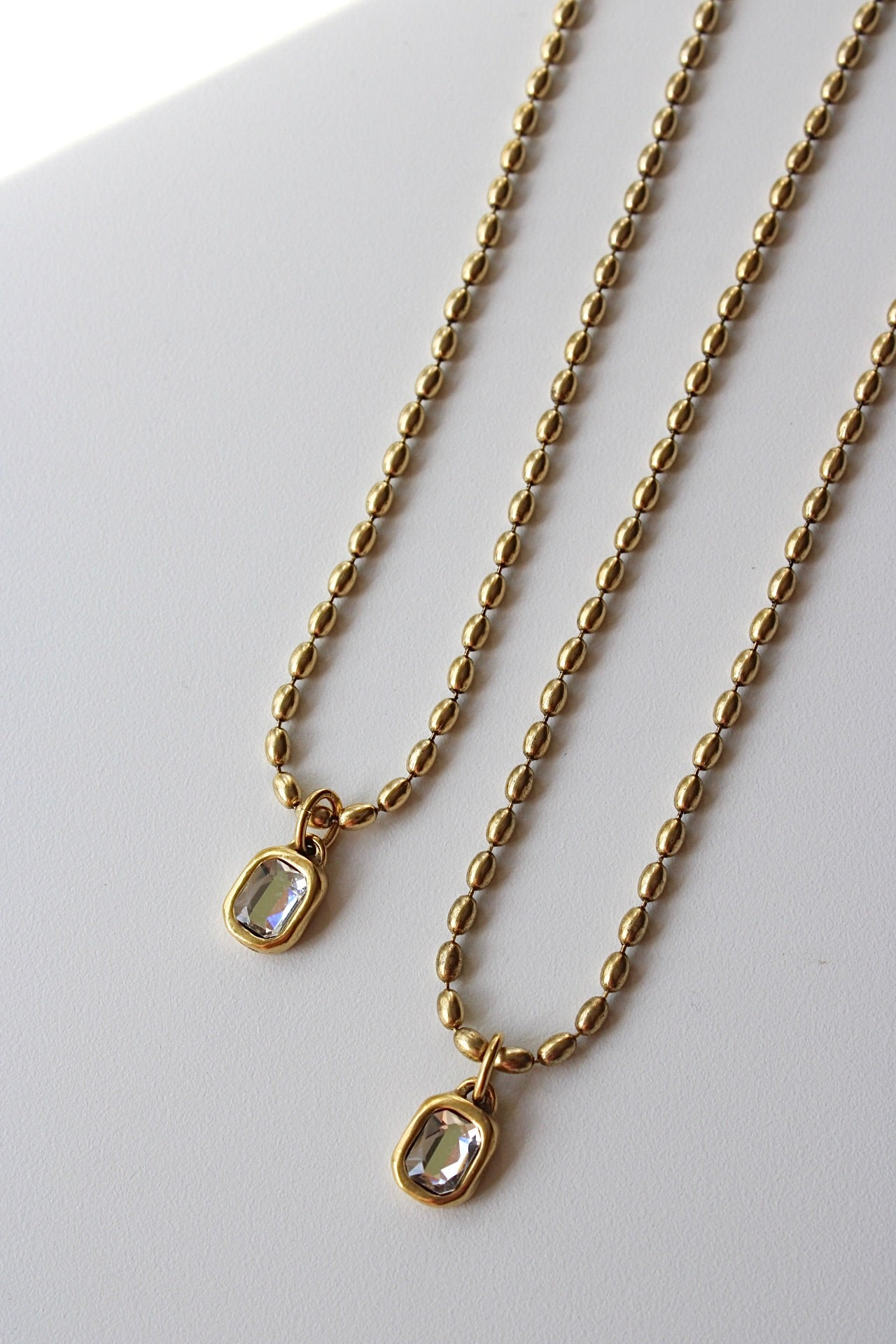 Bezel Crystal Necklace in Antique Gold